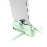 Batterie externe mini Rixus RXPB98G Click-On USB-C 5000 mAh verte